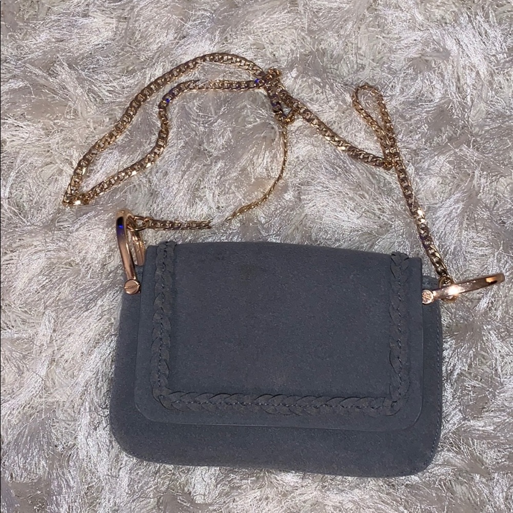 Grey with gold over the shoulder strap